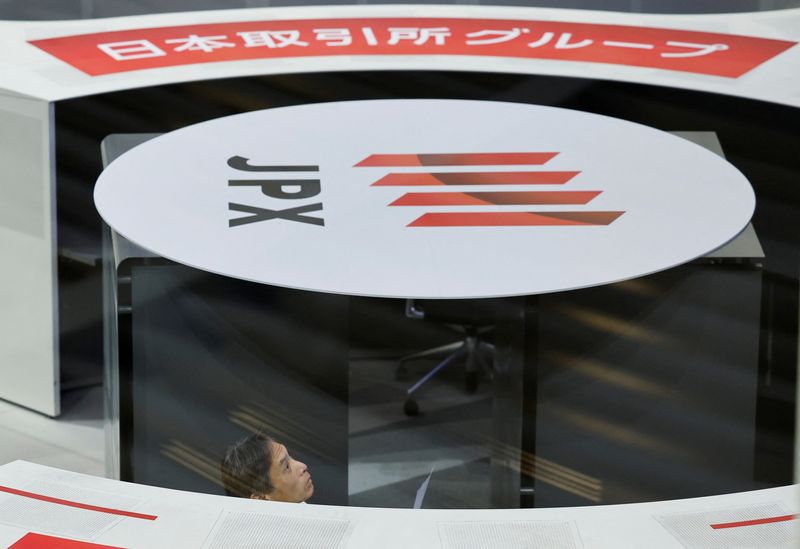 日経平均は3日ぶり反発、金利低下を好感 中東不透明感はくすぶる
